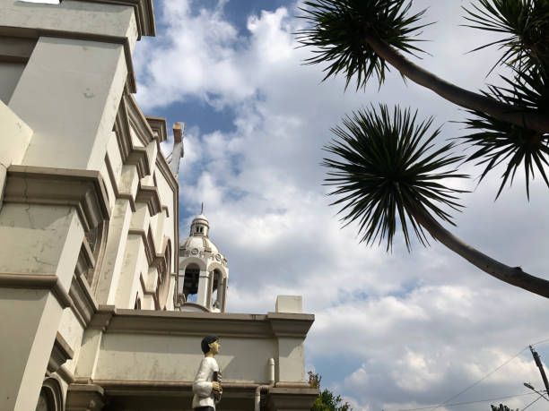 istock Roman Catholic chapel tower under a blue sky. backgrounds. low angle 2151525682