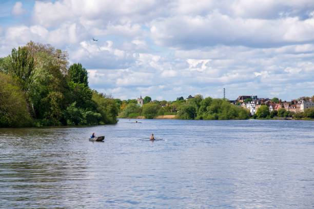 Hammersmith, United Kingdom - May 04, 2024: Boats on the Thames between Hammersmith and Chiswick