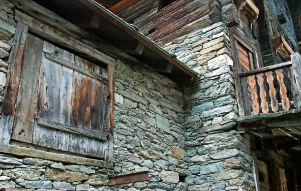 old wooden houses with flowers