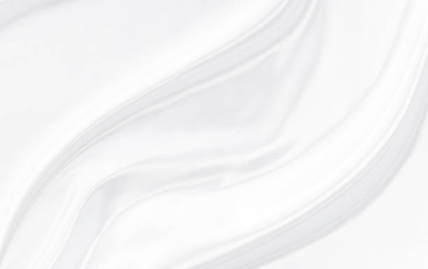istock White gray satin texture that is white silver fabric silk background with beautiful soft blur pattern natural. 2151527860