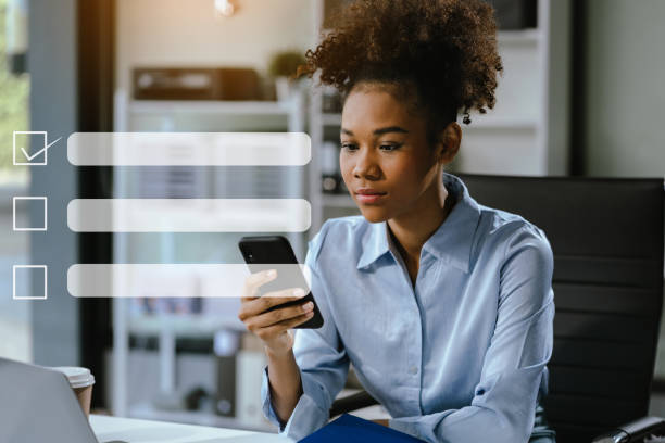 istock Business performance checklist concept, businesswoman using tablet and laptop doing online checklist survey, filling out digital form checklist. 2151531969