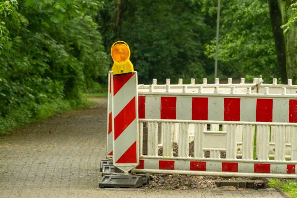 istock Construction site, white red barrier along the road 2151533087
