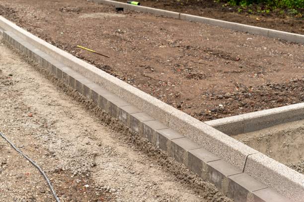 istock construction site, construction of a road and a sidewalk 2151533106