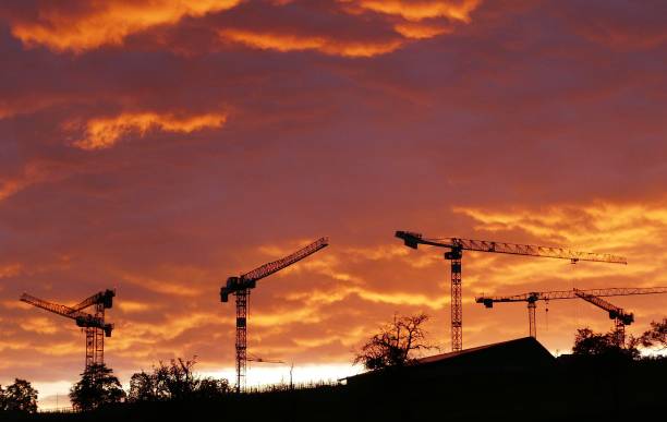 istock Cranes of a large construction site 2151535646