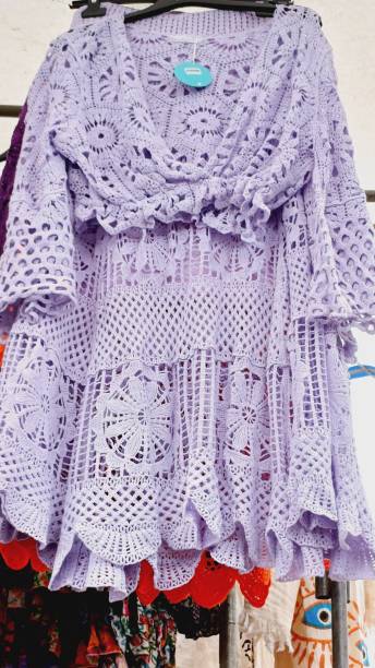 istock purple hand-knitted sweater 2151535967