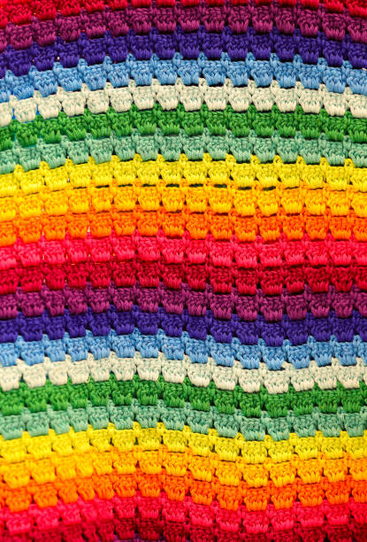 istock background of colorful crocheted blanket with a rainbow pattern 2151536079