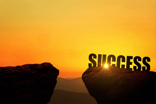 istock High mountain top with text Success and cliff at sunset, concept. Creative idea success. 2151536087