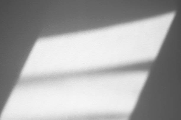 istock Abstract lines, shadows, light from window on white paper as overlay, texture or background 2151537691