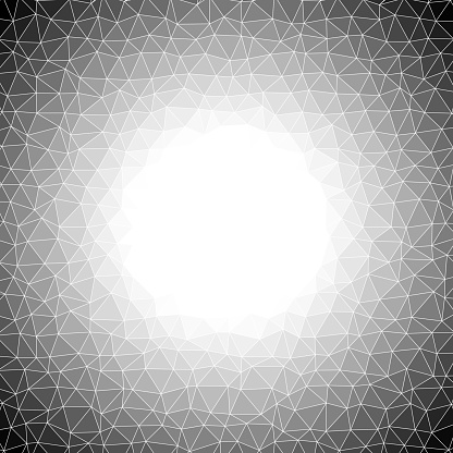 Full frame pattern of individually colored triangles with global gradient. Centered bright light making copy space and strong vignette.