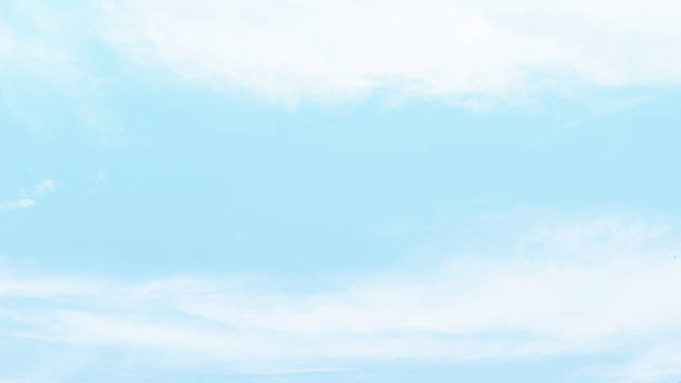 istock Pastel blue sky with white fluffy cloud. Summer holiday sky background. 2151539467