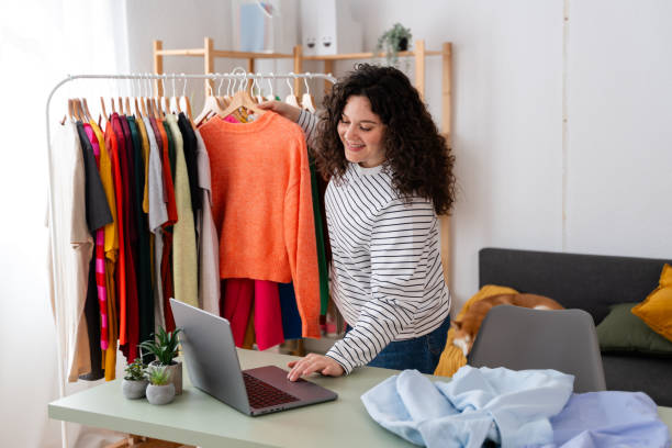 istock Fashion blogger selecting outfits for content creation 2151540404