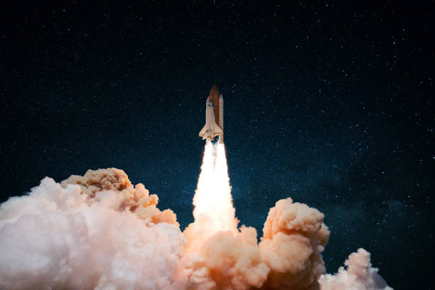istock New Space Shuttle rocket with puffs of smoke and blastoff successfully launched into space. Spaceship lift off. Start up, concept 2151541064