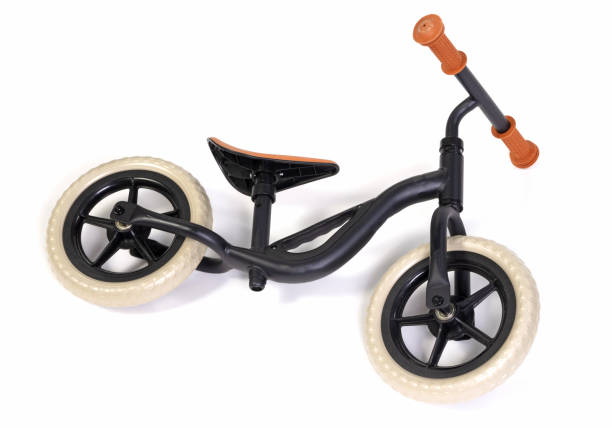 istock Modern black balace bike for a small child, isolated 2151541292
