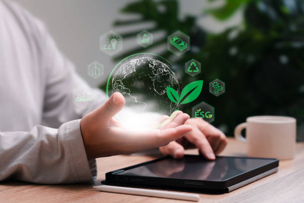 istock Green business Climate neutral long-term strategy, Virtual globe reducing carbon concept, A man aware of environmental problems,  Decarbonization, Greenhouse gas emission targets Technology 2151545130