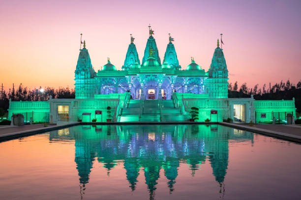 istock BAPS Shri Swaminarayan Mandir Hindu Temple at sunset 2151547031