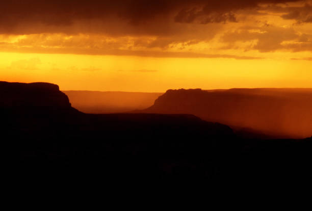 Grand Canyon dirung a storm and other weather conditions, sunset