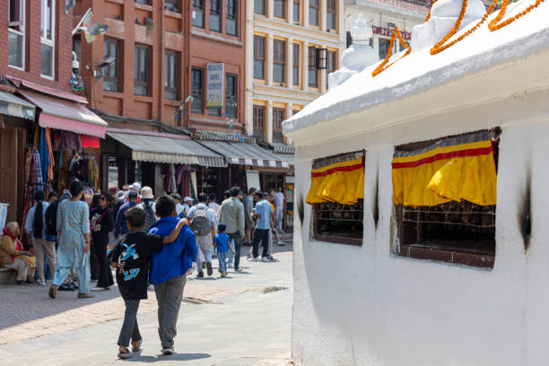 Kathmandu, Nepal-April 23,2024: Buddhists, and visitors typically come here to meditate, pray, and chant mantras while circumambulating the stupa