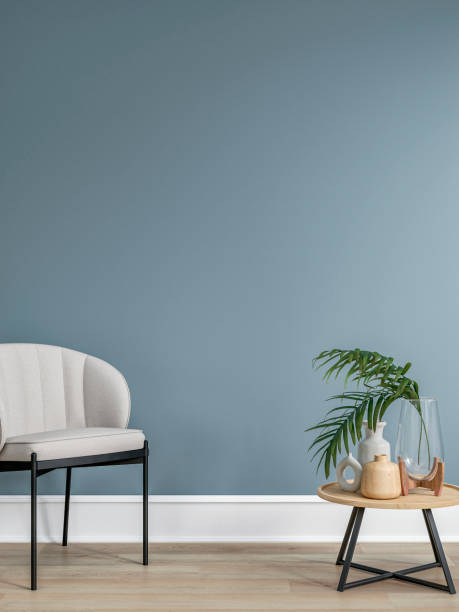 istock Cozy retro-chic interior with an art deco armchair and low coffee  table, high baseboard, 50s- 60s decoration 2151557090