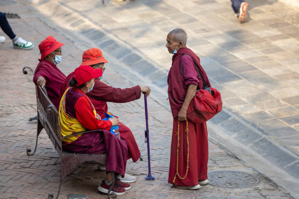 Kathmandu, Nepal-April 23,2024: Buddhists, and visitors typically come here to meditate, pray, and chant mantras while circumambulating the stupa