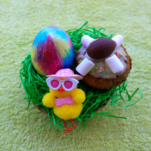 istock Easter egg, cupcake and baby chicken 2151558489