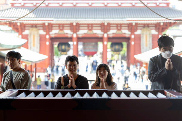 Tokyo, Japan-April 28,2024: In Sensoji Temple, visitors often make donations to support the maintenance and operation of the temple. These donations are typically placed in donation boxes located within the temple grounds.