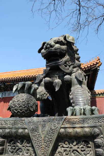 istock stone lion with a ball under its paw Beijing 2151564256