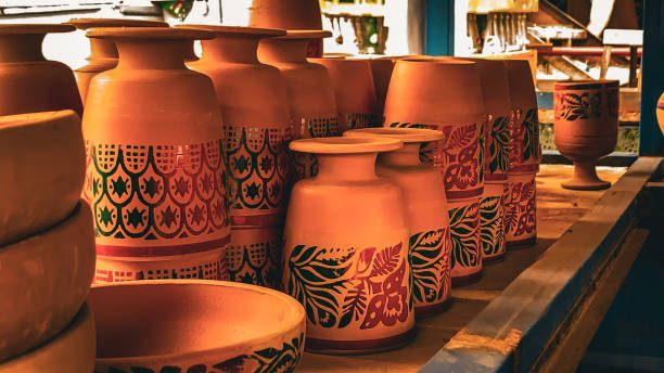 istock Handmade ceramic clay-based earthenware used for drinking and cooking. Realistic clay kitchenware set, various terracotta pots shapes of clay pot materials for sale 2151567938