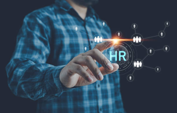istock HR management, Human resources management concept, Technology and network concept. CRM, HR word button. Businessman presses hr icon on virtual screen on background of network business success sign. 2151569653