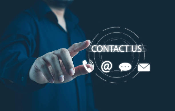 istock Contact us or Customer support hotline, people connect. Businessman touching on virtual screen contact icons (email, address, live chat, telephone). Customer service, helpdesk advice online support. 2151569820