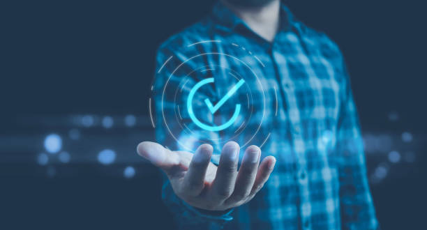 istock Quality, service guarantee, Validation concept for business process automation, quality assurance management,certification, digital transformation. businessman touching checked icon on virtual screen. 2151569838