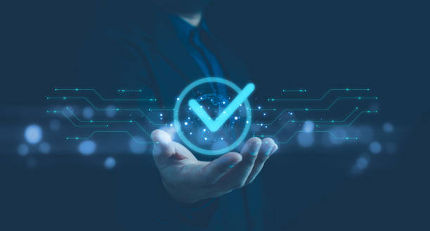 istock Businessman hand showing check mark digital technology icon symbol. Top quality assurance service concept, product performance assurance, and industry-leading ISO certification. 2151569840