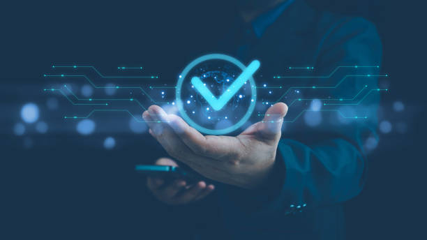 istock Businessman hand showing check mark digital technology icon symbol. Top quality assurance service concept, product performance assurance, and industry-leading ISO certification. 2151569843