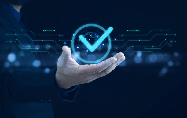 istock Businessman hand showing check mark digital technology icon symbol. Top quality assurance service concept, product performance assurance, and industry-leading ISO certification. 2151569848