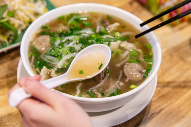 istock Authentic Vietnamese Beef Pho Served with Bean Sprouts and Fresh Herbs 2151571131