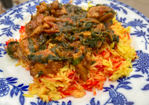 istock Chicken and spinach curry on pilau rice 2151573203
