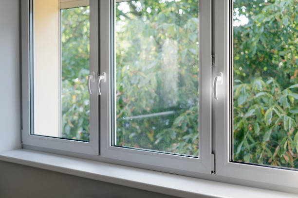 istock White window frame with modern aluminium profiles in bedroom 2151580445