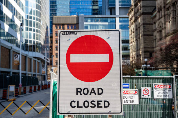 Road closed sign on a street.