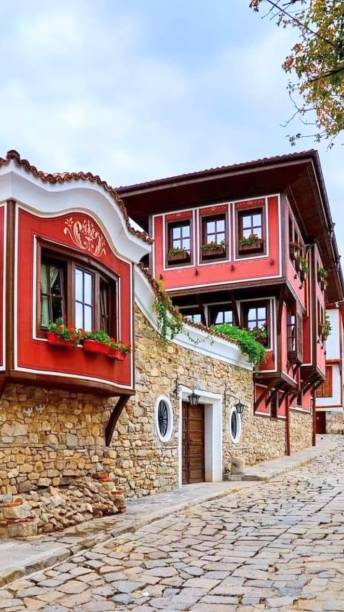 istock red wooden house 2151589159