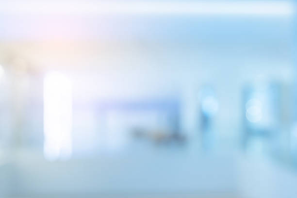 istock Abstract blurred inside interior of hospital building background with shine light for advertisement design and show content concept 2151594034