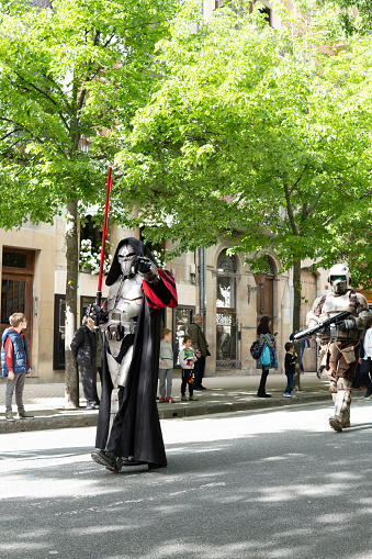 05/04/2024 Pamplona, Navarra, Spain. The pink force cancer association parade. Star Wars Day. Sith Kilo Ren on the street