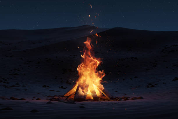 istock large bonfire with sparks and particles at sand dunes at night. 3D Rendering 2151598212