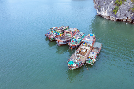 Fishing boats anchored in Halong Bay, Vietnam