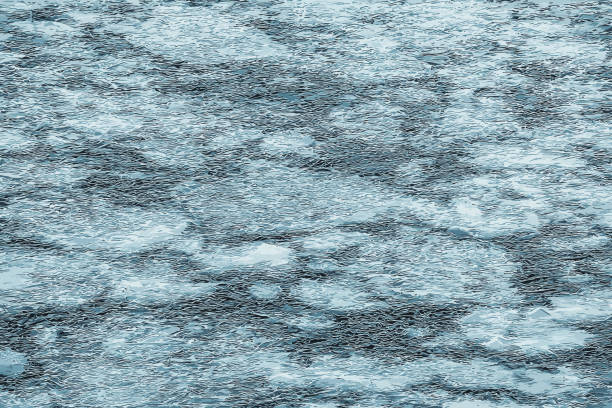 istock Vector illustration of an icy river surface. Texture of ice and water fragments. Winter background 2151606784
