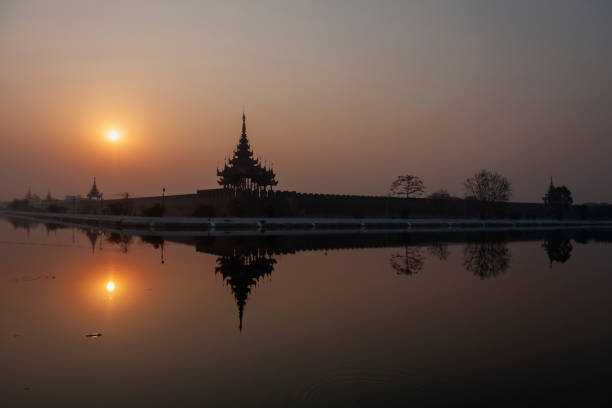 istock Mandalay Palace wall on the moat at Sunrise 2151610026