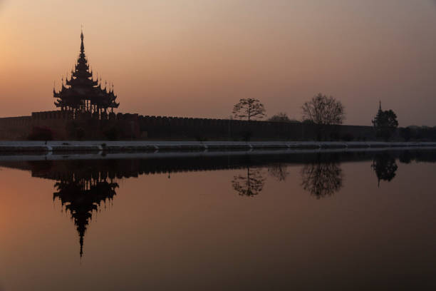 istock Mandalay Palace wall on the moat at Sunrise 2151610032