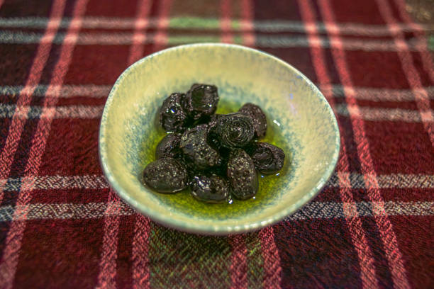 istock Mediterranean Temptation: Olives in a Small Dish 2151611041
