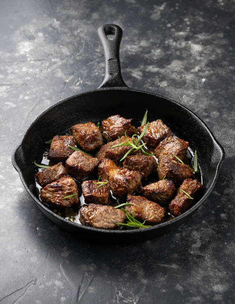 istock Garlic butter beef steak bites in iron cast pan 2151614450