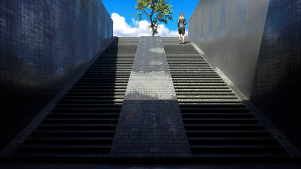 istock Walking up stairs into the sunlight. 2151615004