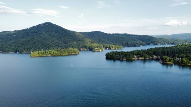 istock calm lake water overlooking the mountains 2151615236
