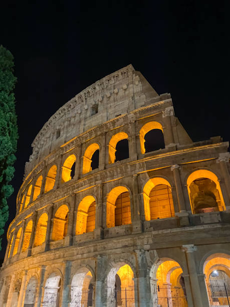 istock Facade of the Coliseum in Rome on a summer night 2151615316